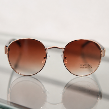 lentes marrón degradé. Diseño moderno y comercial para locales, tiendas online y reventa.