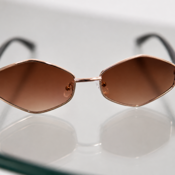 Anteojos geométricos marrones con marco rose gold
