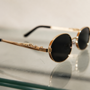 Lentes de sol dorados